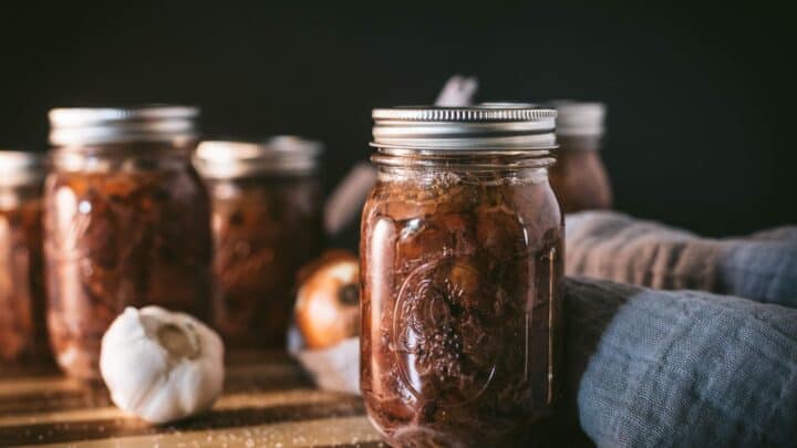 Canned venison in a glass canning jar.