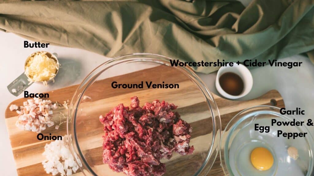 Ingredients for a venison burger recipe laid out on a table