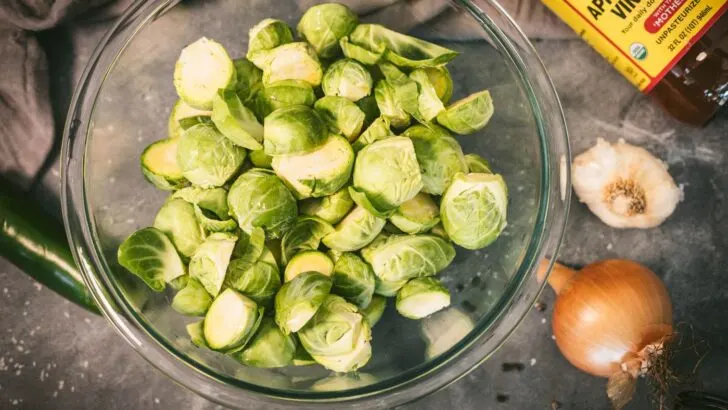 Halved brussels sprouts in a bowl.